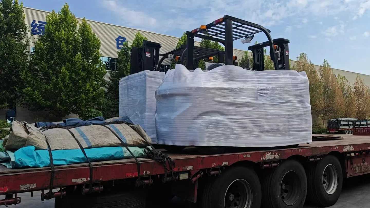 Wrapped forklifts on a transport vehicle